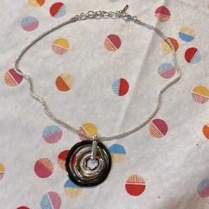 Silver chain necklace with layered circle pendant